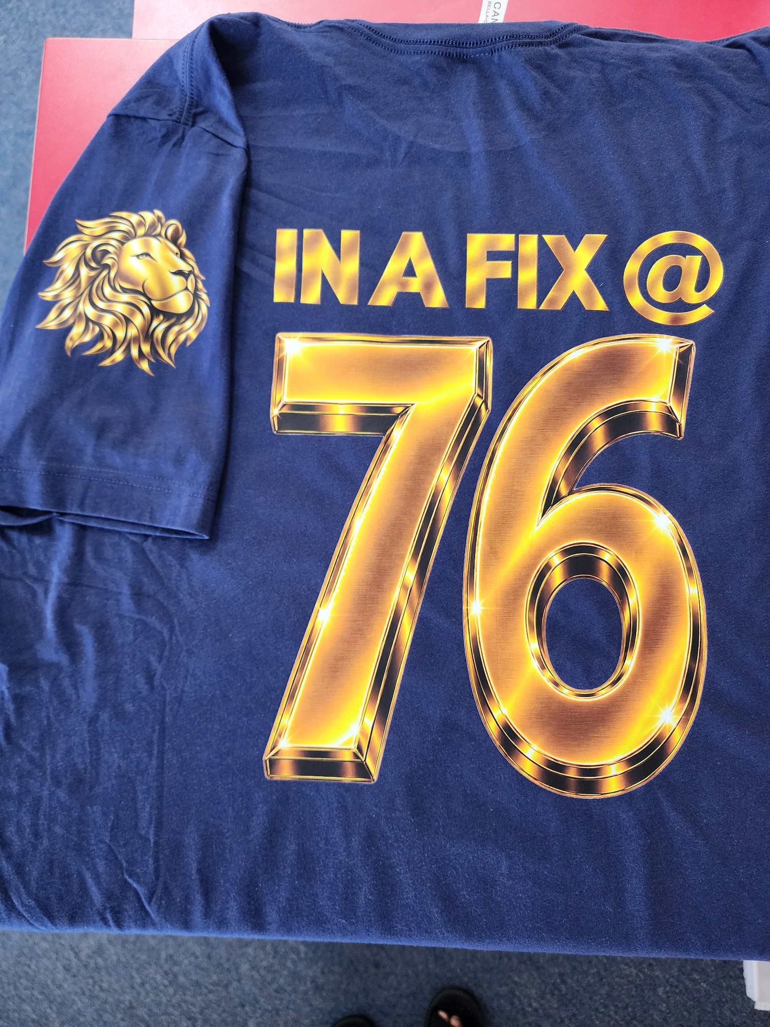 Metallic gold number shirt